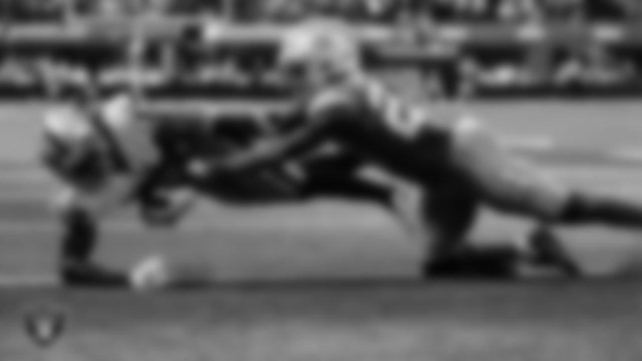 Las Vegas Raiders wide receiver Davante Adams (17) makes a 3-yard touchdown catch during the regular season away game against the Los Angeles Chargers at SoFi Stadium.