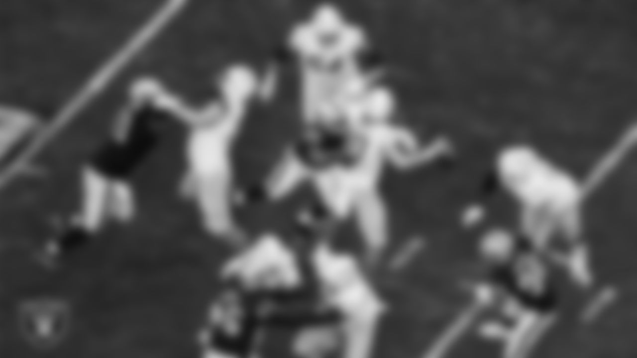 Las Vegas Raiders defensive lineman Jerry Tillery (90) pressures the quarterback during the regular season home game against the Los Angeles Chargers at Allegiant Stadium.