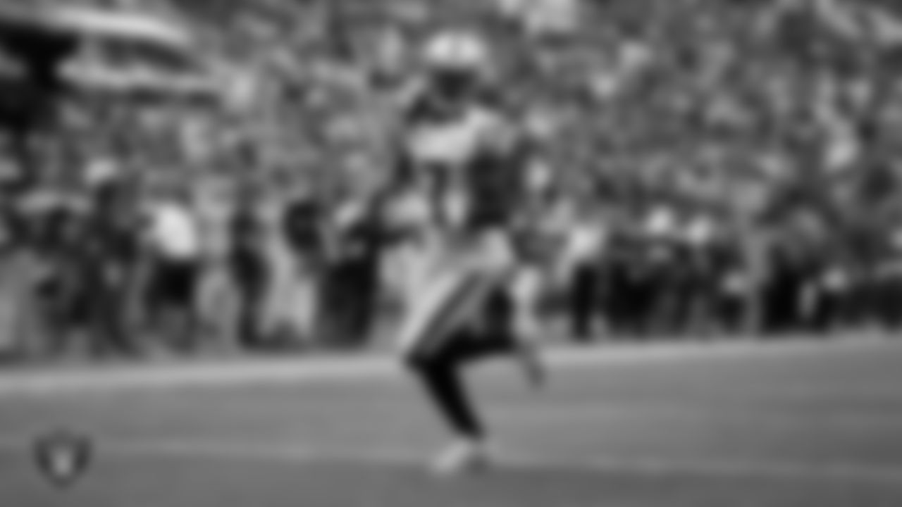 Las Vegas Raiders wide receiver Davante Adams (17) makes a 38-yard touchdown catch during the regular season away game against the Jacksonville Jaguars at TIAA Bank Field.