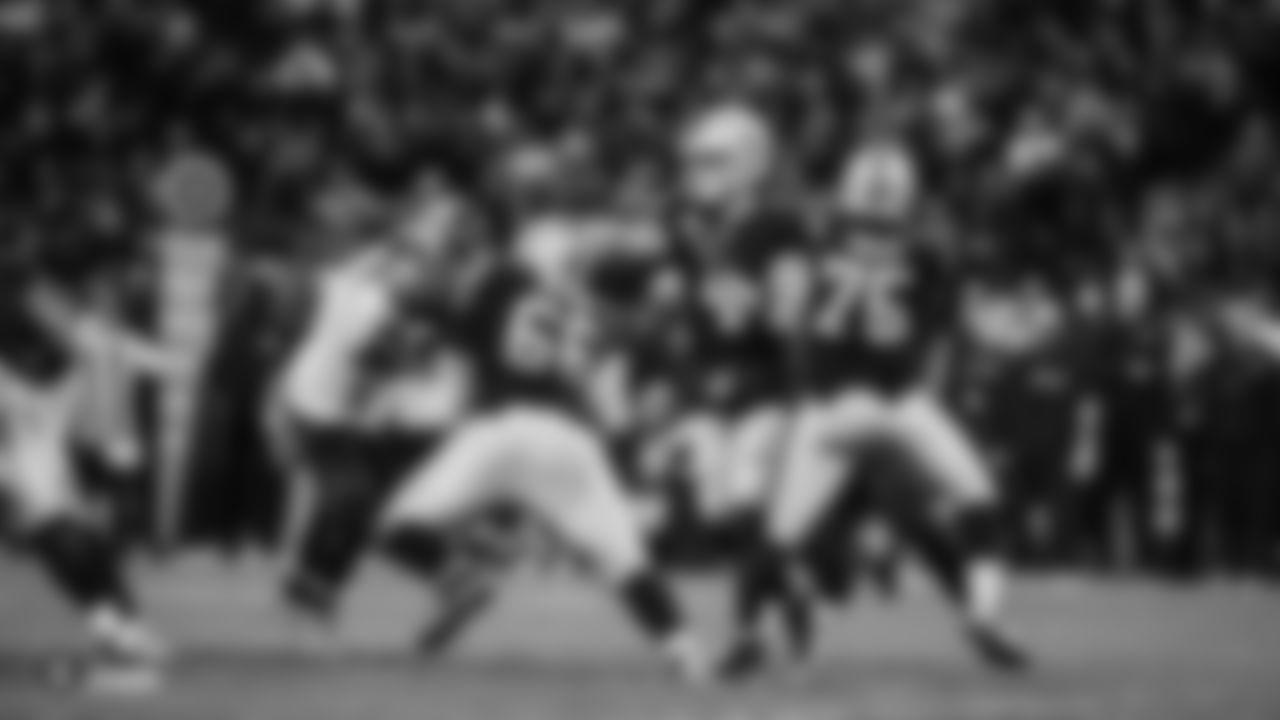 Oakland Raiders quarterback Derek Carr (4) makes a play Oakland Raiders regular season game against the Seattle Seahawks at Wembley stadium on October 14th, 2018, in London, United Kingdom. The Oakland Raiders lost 27-3.
