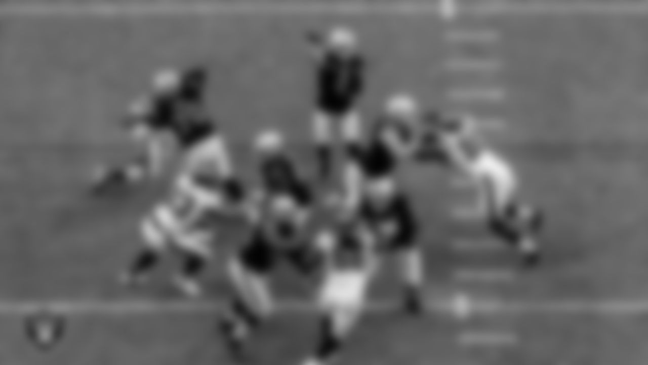 Las Vegas Raiders tackle Sam Young (70), center Rodney Hudson (61), guard Gabe Jackson (66), tackle Denzelle Good (71) and tackle Kolton Miller (74) block as quarterback Derek Carr (4) passes during the regular season home game against the Tampa Bay Buccaneers.