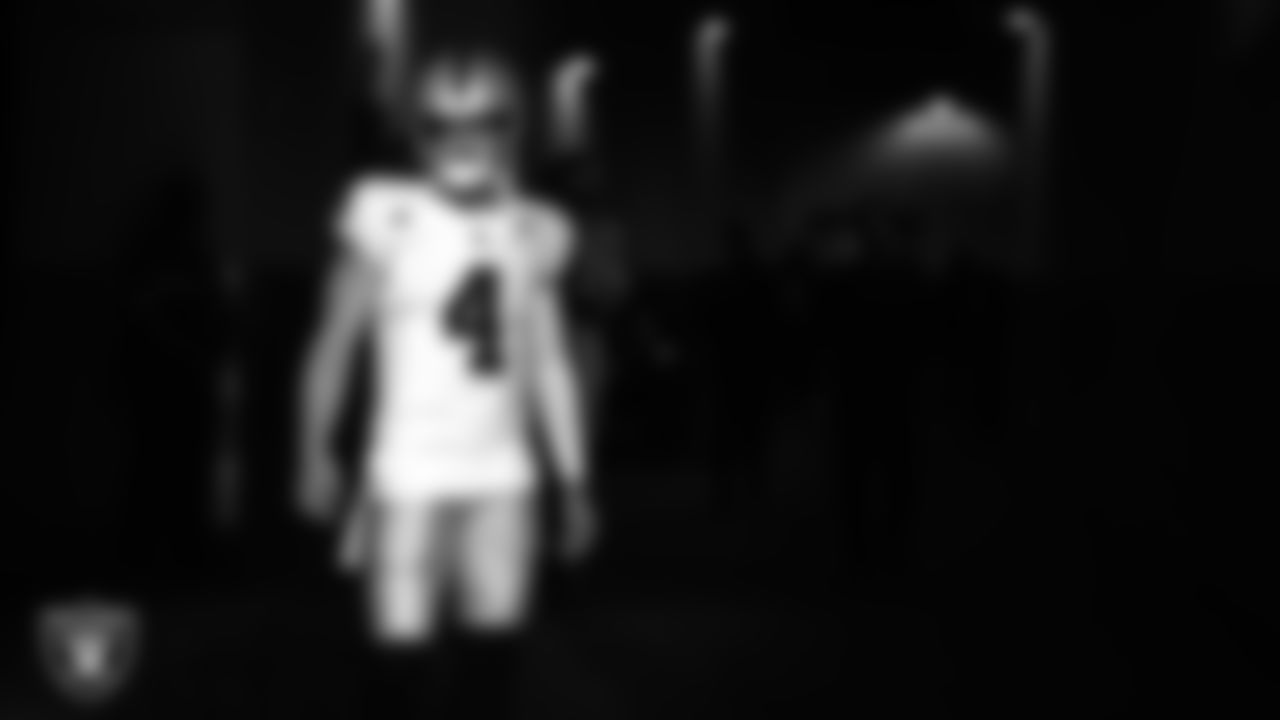 Las Vegas Raiders quarterback Derek Carr (4) walks down the tunnel before the preseason away game against the Los Angeles Rams at SoFi Stadium.