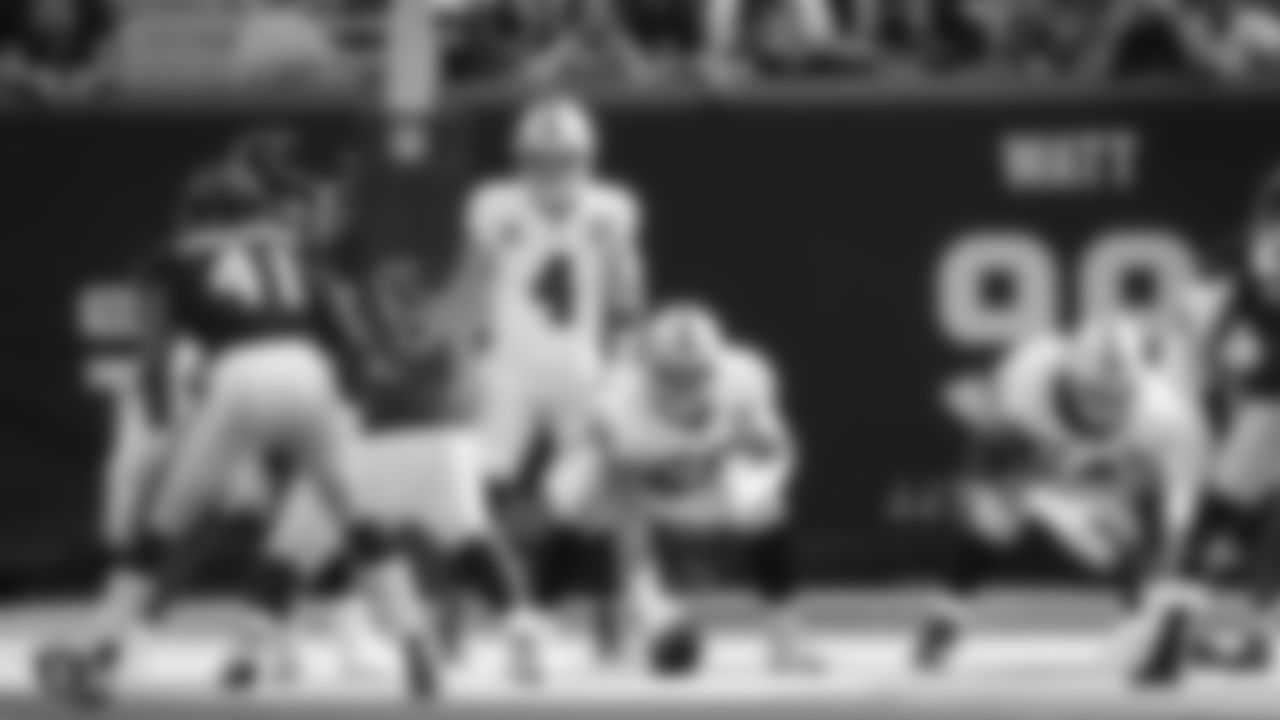 Raiders quarterback Derek Carr (4) and offensive lineman Andre James (68) during the regular season game against the Houston Texans at NRG Stadium.