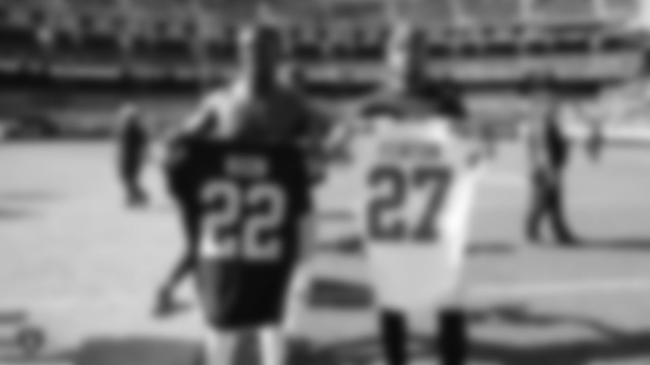Raiders cornerback Keisean Nixon (22) swaps jerseys with Kansas City Chiefs cornerback Rashad Fenton (27) after the Raiders regular game against the Kansas City Chiefs.