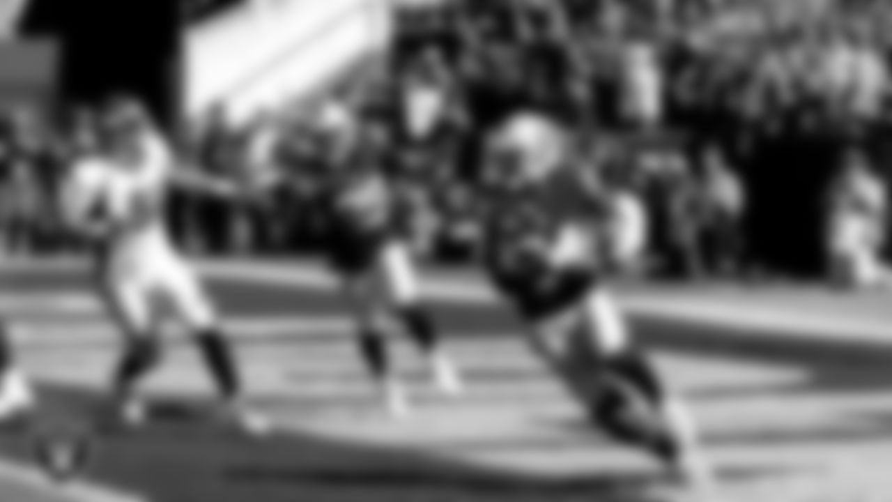 Raiders defensive back Charles Woodson (24) intercepts a pass during the regular season home game against the Denver Broncos at O.co Coliseum, Sunday, October 11, 2015, in Oakland, Calif.