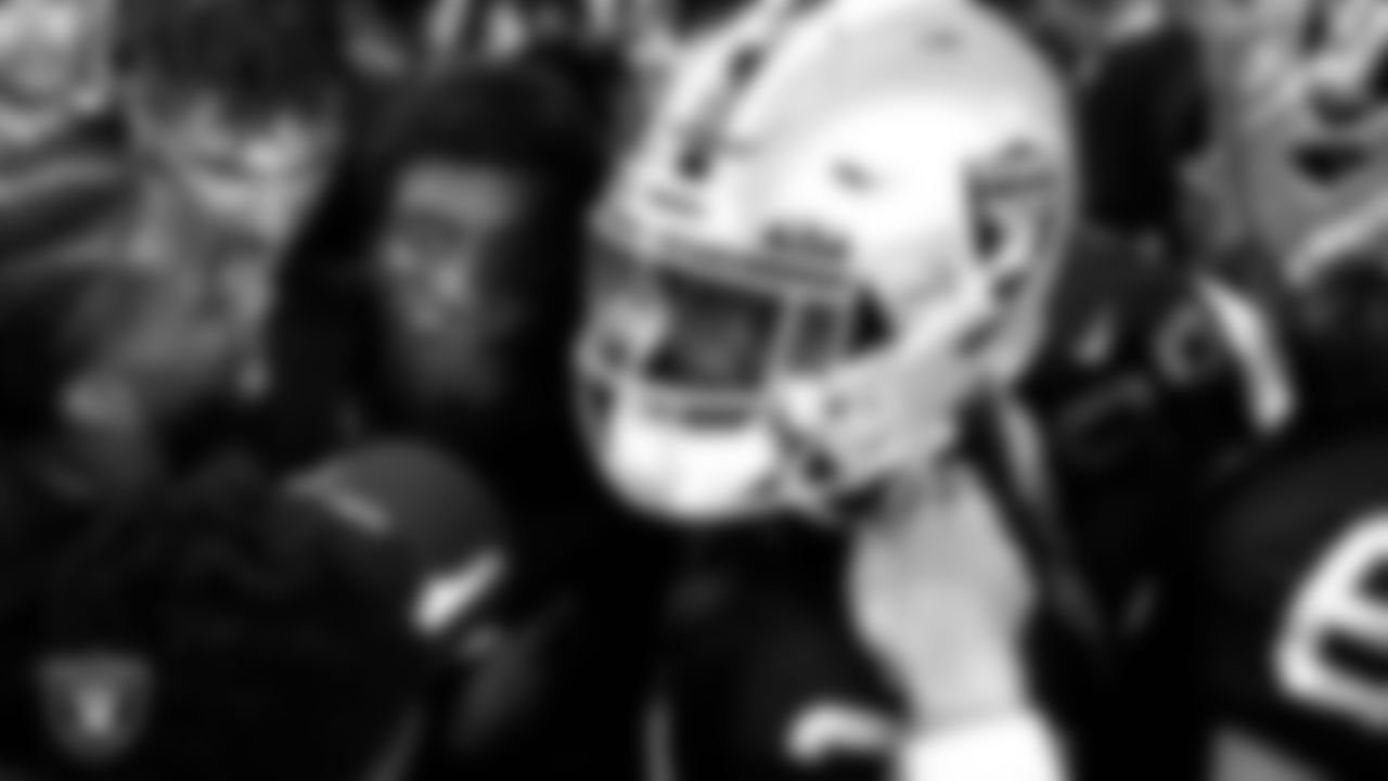 Las Vegas Raiders wide receiver Zay Jones (7) is congratulated by teammates after making a game-winning 31-yard touchdown catch during the regular season home game against the Baltimore Ravens.