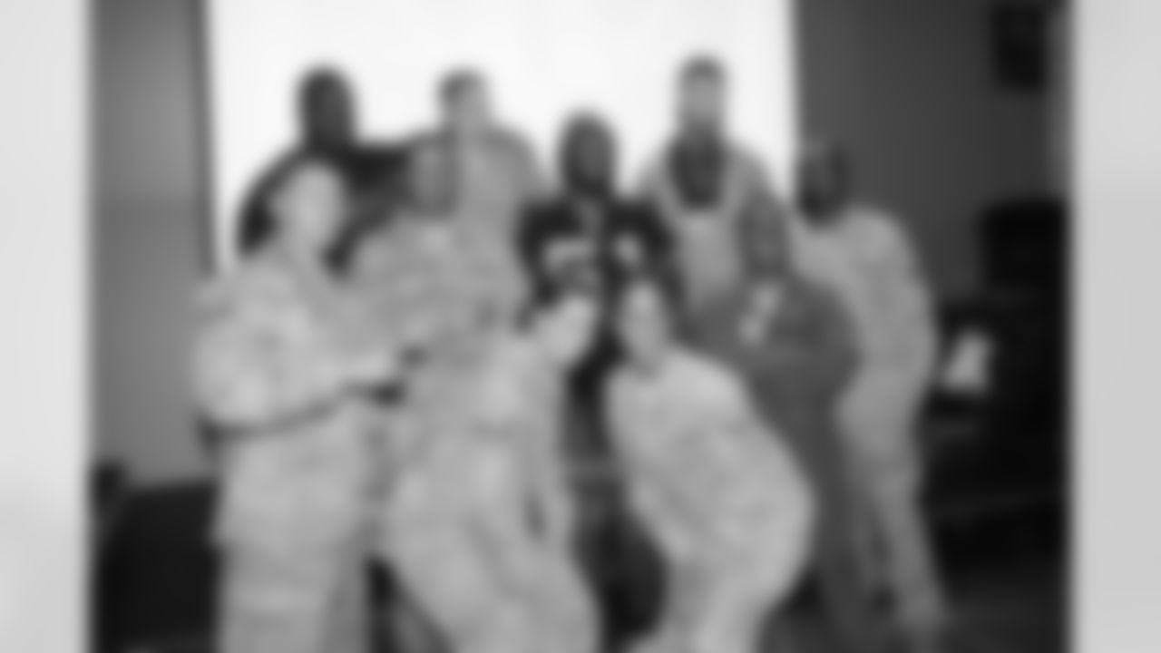 LB Aaron Curry spends time with the servicemen and women at Travis Air Force Base.