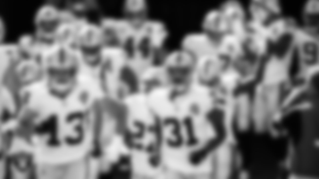 The Las Vegas Raiders are introduced onto the field before their regular season away game against the Kansas City Chiefs.