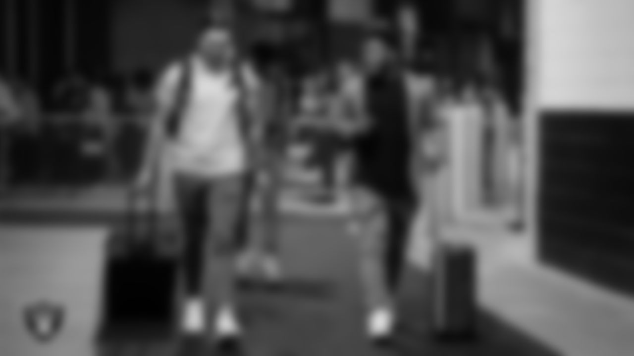 Las Vegas Raiders quarterback Chase Garbers (15) and running back Josh Jacobs (28) arrive to the regular season away game against the Jacksonville Jaguars at TIAA Bank Field.