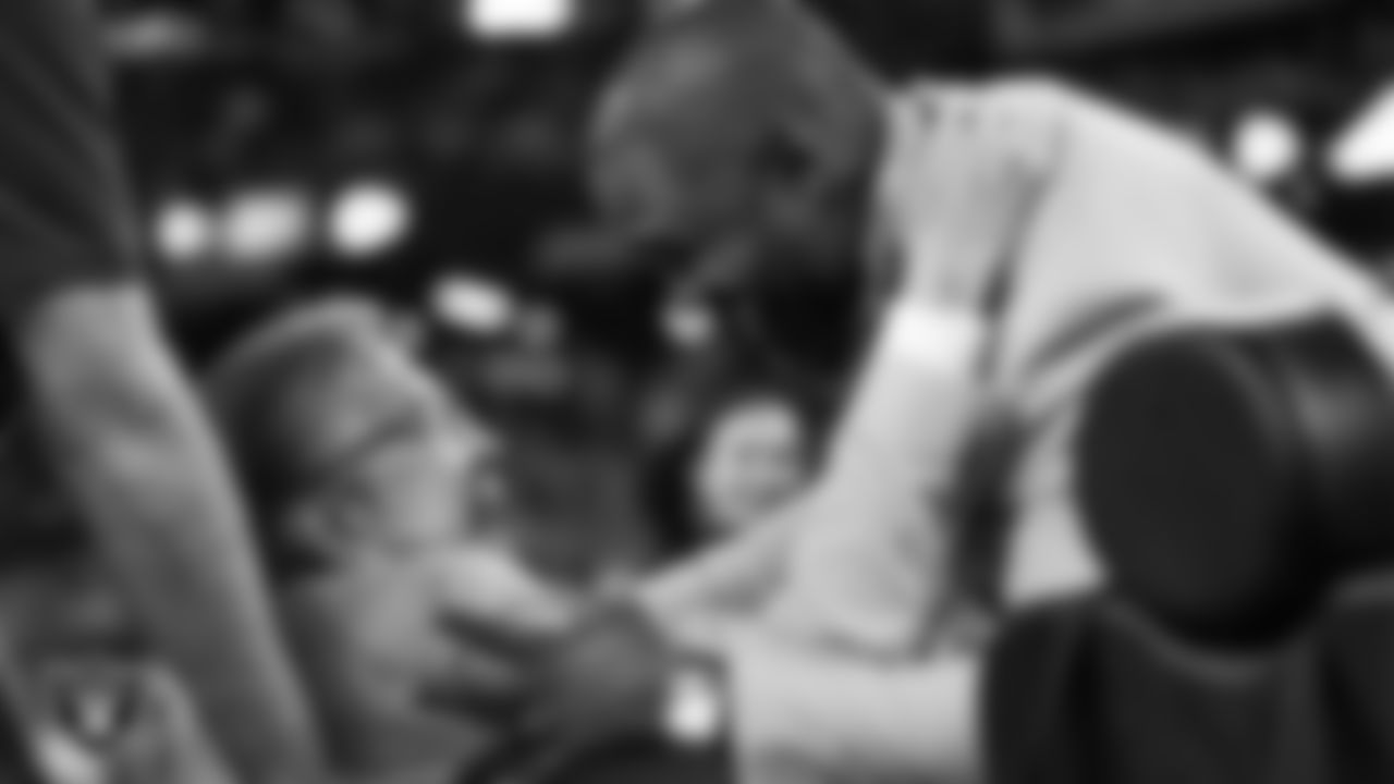 Las Vegas Raiders Hall of Famers, Charles Woodson and Tom Flores, hug after Woodson was presented with the Ring of Excellence before the Las Vegas Raiders regular season home game against the Kansas City Chiefs.
