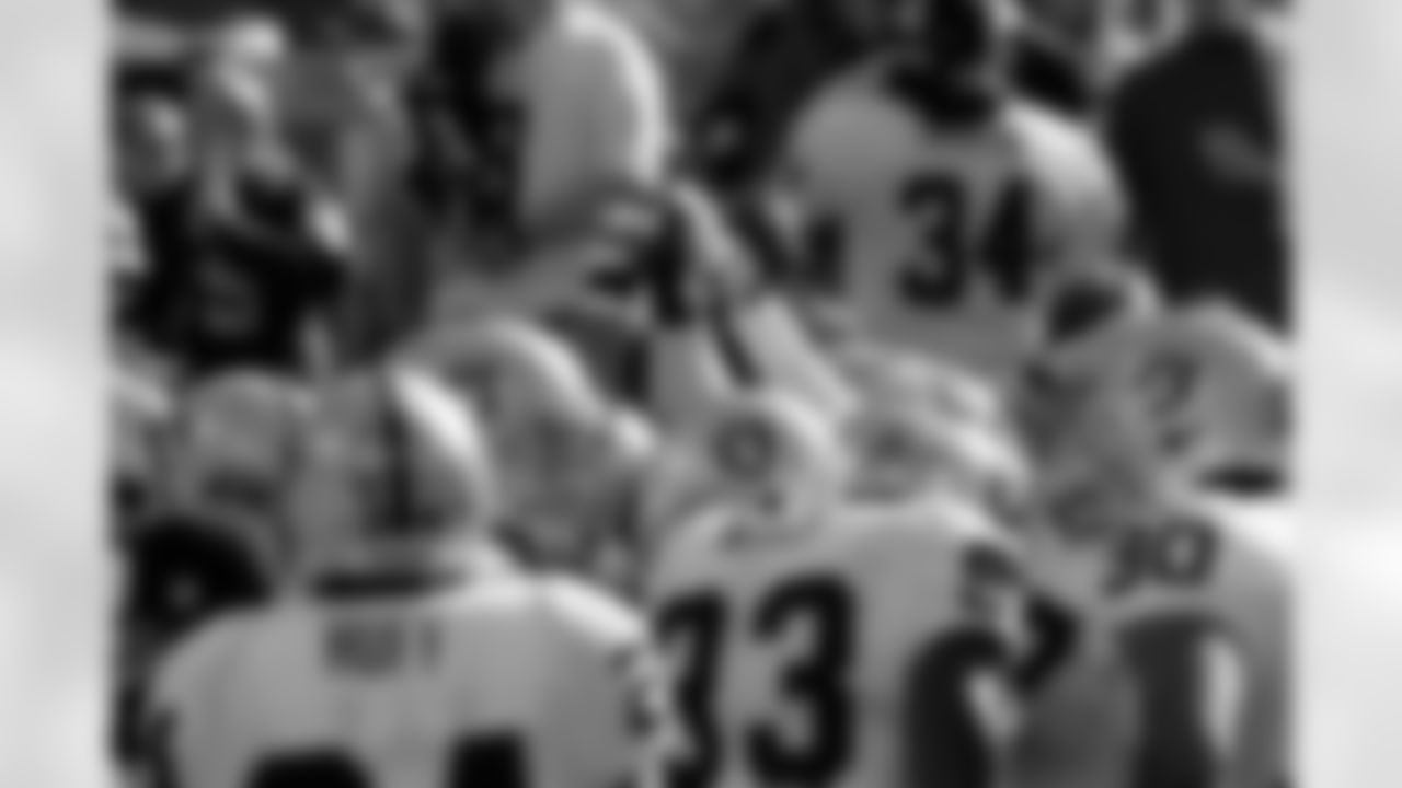 The defense huddles up before kickoff.