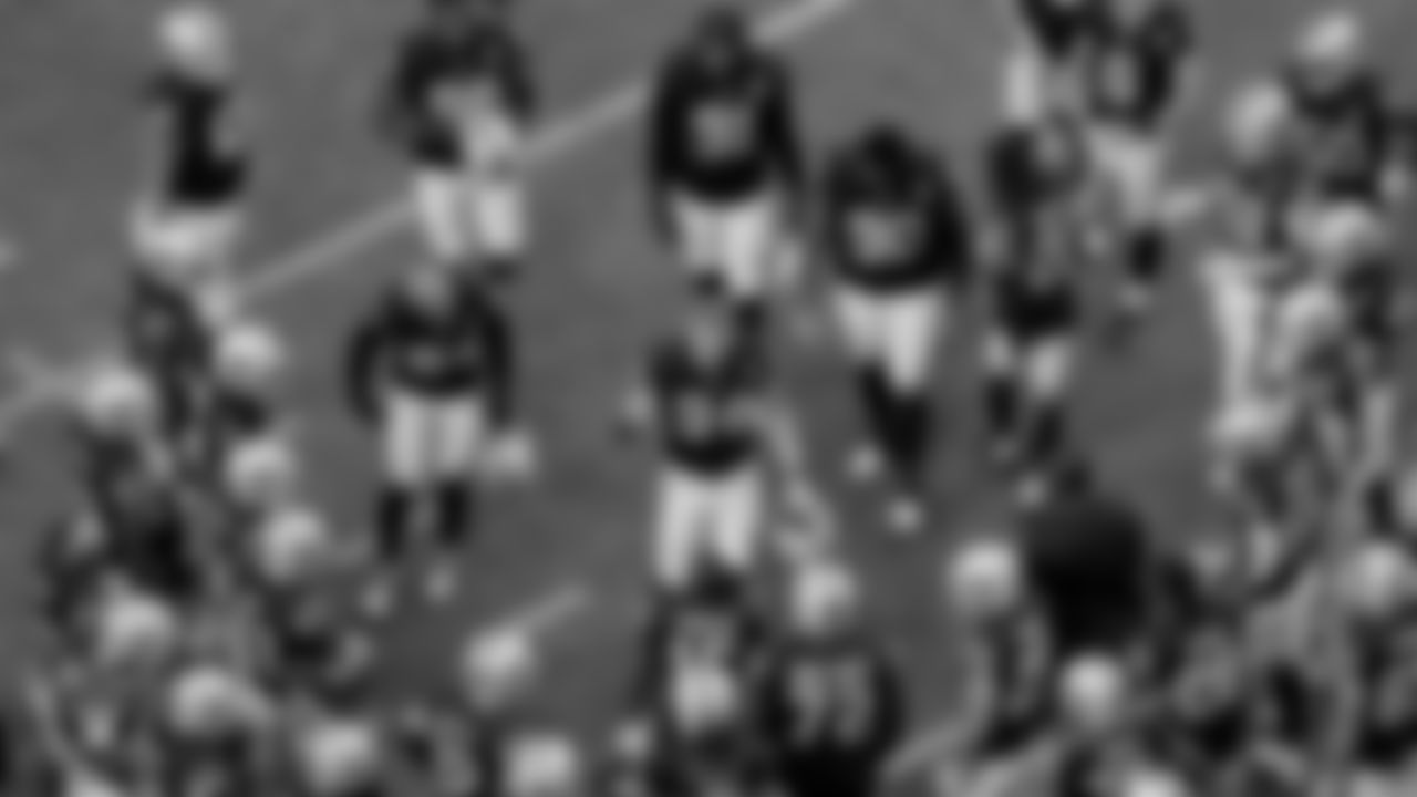 The Raiders huddle before the regular season game against the Denver Broncos at Allegiant Stadium.