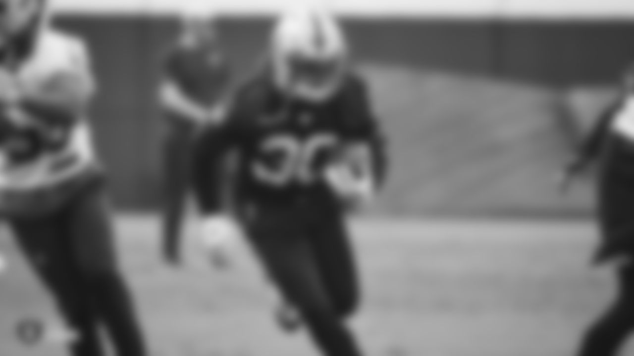 Raiders running back Jalen Richard (30) rushes during practice.