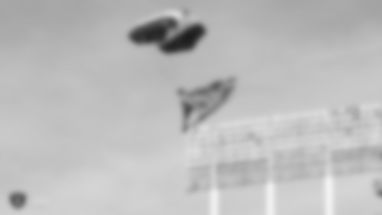 Frog-X Parachute Team parachutes into Oakland-Alameda County Coliseum before the Oakland Raiders regular season game against the Los Angeles Chargers, Sunday, November 11, 2018, in Oakland, California. The Oakland Raiders lost 20-6.