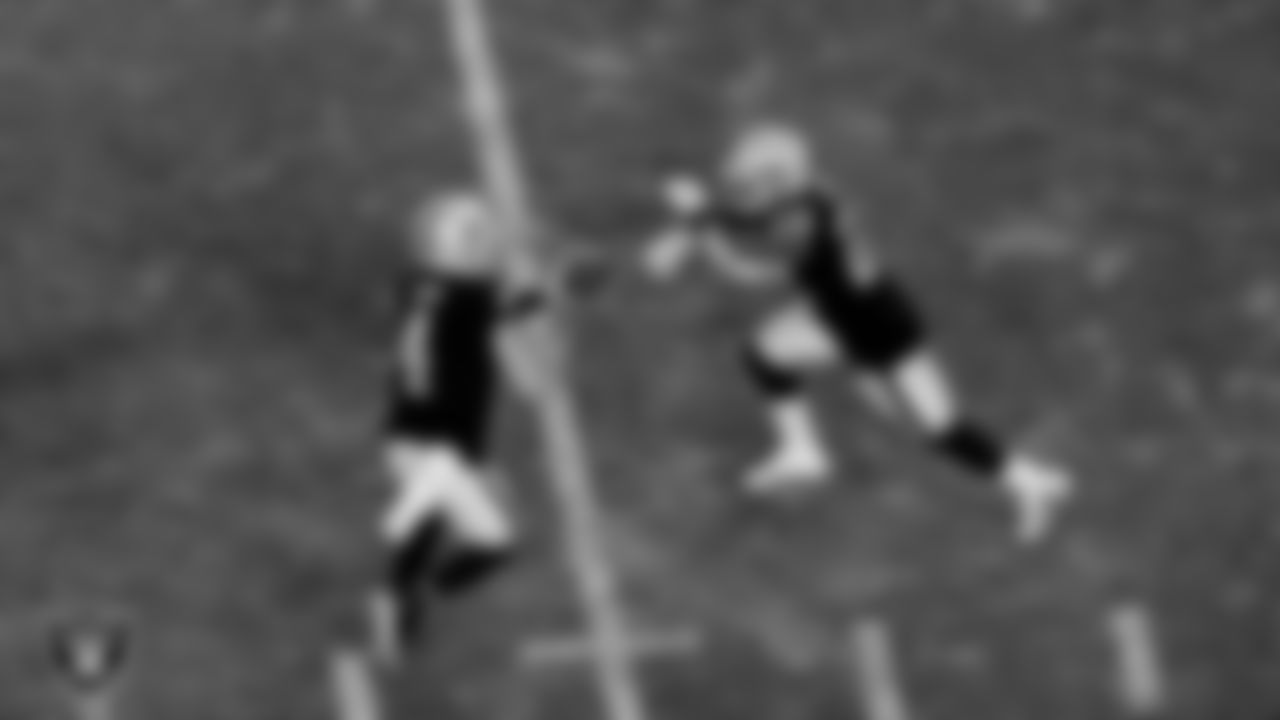 Las Vegas Raiders quarterback Derek Carr (4) and running back Josh Jacobs (28) during the regular season game against the Kansas City Chiefs at Allegiant Stadium.
