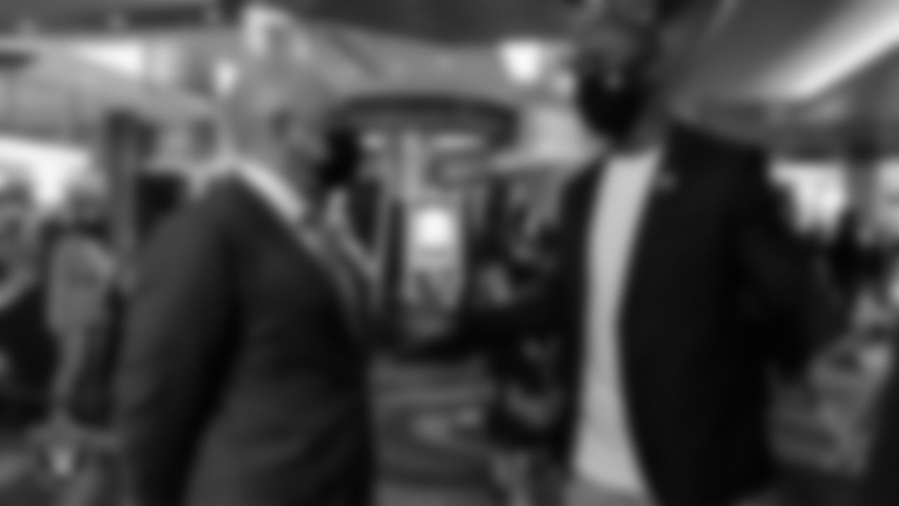 Las Vegas Raiders President Marc Badain talks with Hall of Famer Charles Woodson during the opening of the Raiders Tavern & Grill at M Resort Spa Casino.