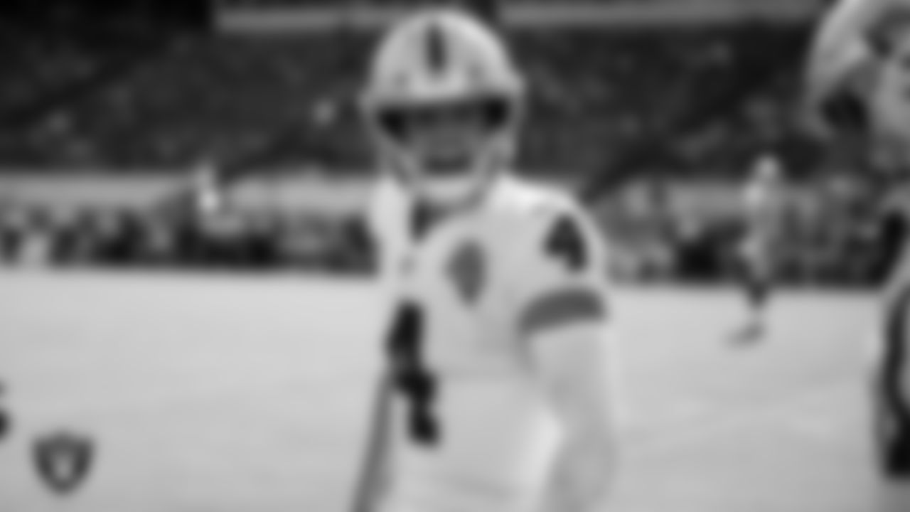 Las Vegas Raiders quarterback Derek Carr (4) celebrates after a touchdown during the regular season away game against the Kansas City Chiefs.