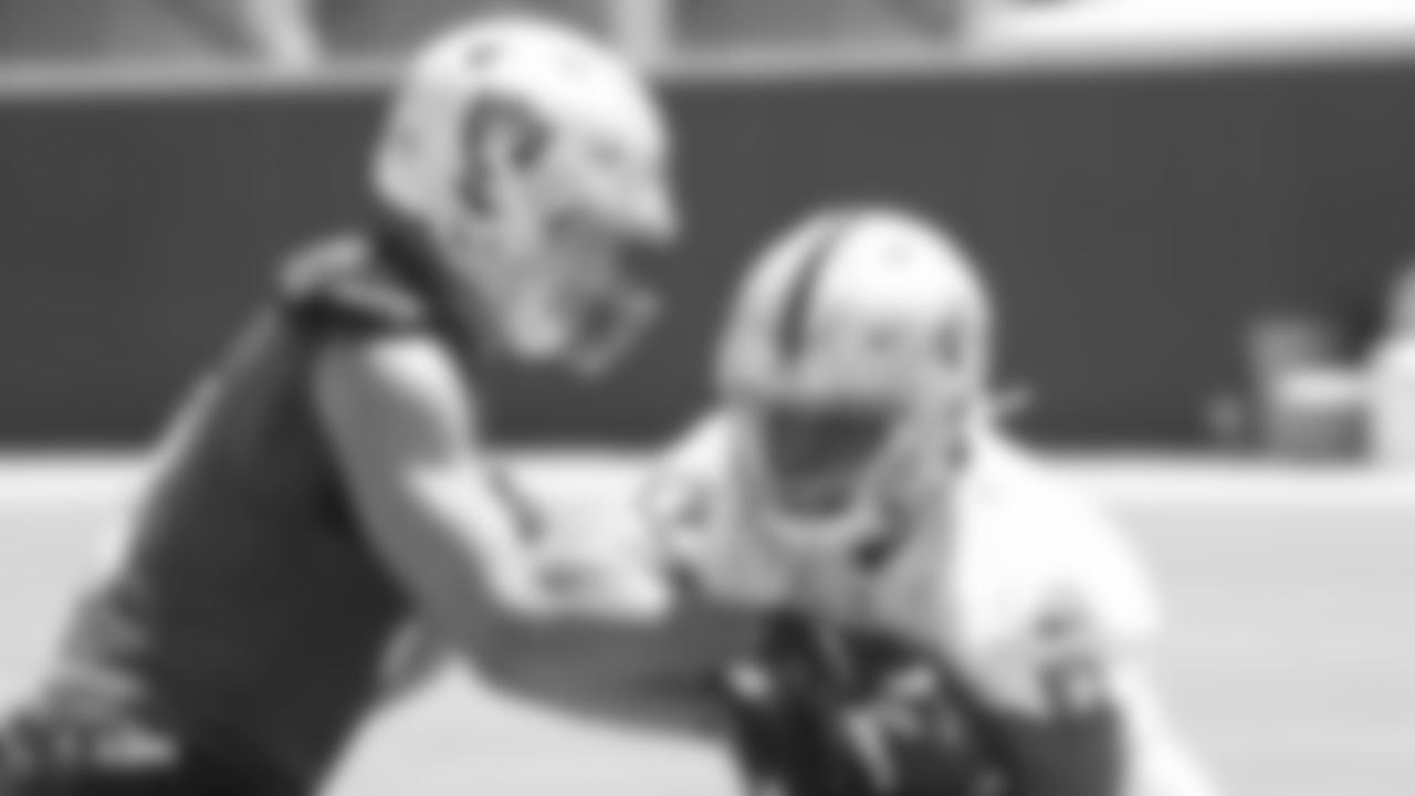 Raiders quarterback Derek Carr (4) and running back Doug Martin (22) at a Mandatory Minicamp at the Raiders Practice Facility in Alameda, Calif.