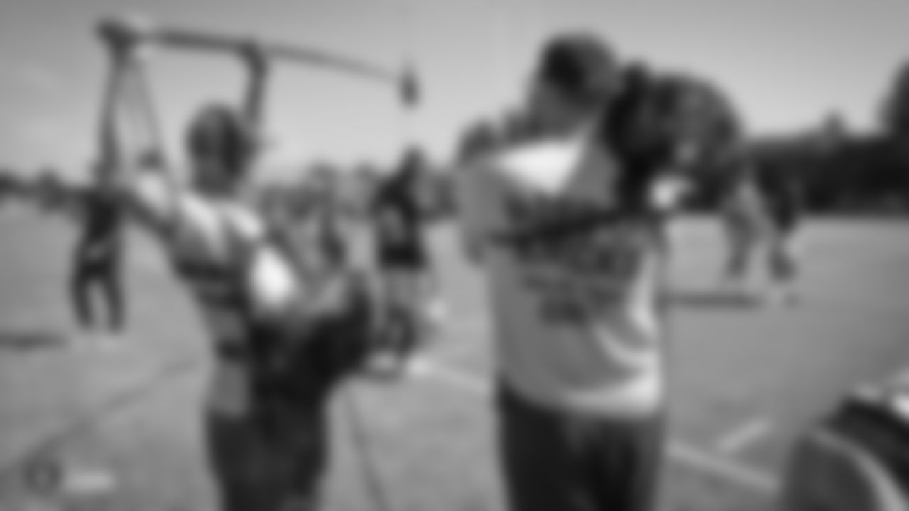 The Hard Knocks film crew on the field for practice at 2019 Training Camp.