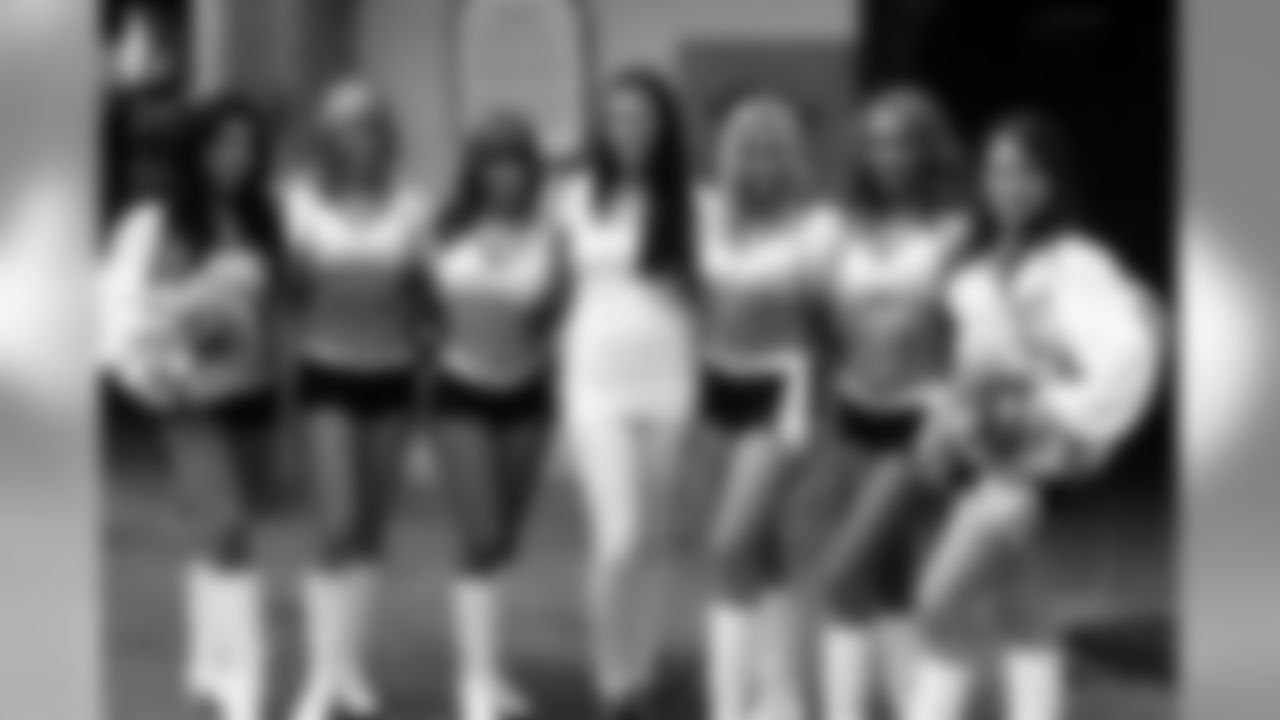 The Raiderettes pose for a photo with Ina Mayerhoff of the SWARCO Raiders staff. Photo by Jeanette Thompson.