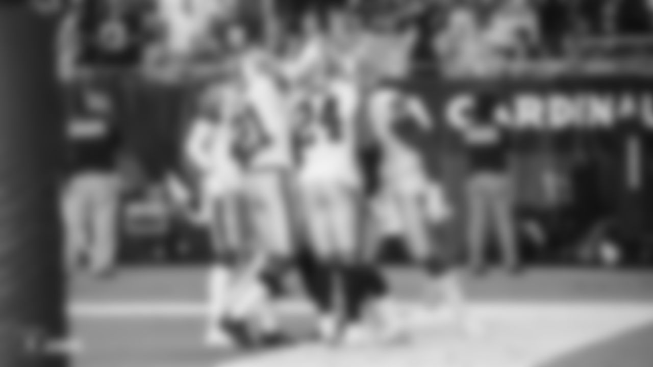 Raiders safety Lamarcus Joyner (29) is congratulated by his teammates after forcing a safety during the Raiders preseason game against the Arizona Cardinals.
