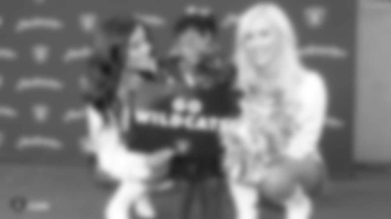 Oakland Raiders alumnus Raymond Chester and the Raiderettes visit Oakland High School to celebrate the kickoff of their 2018 football season, Friday, September 7, 2018, in Oakland, Calif.