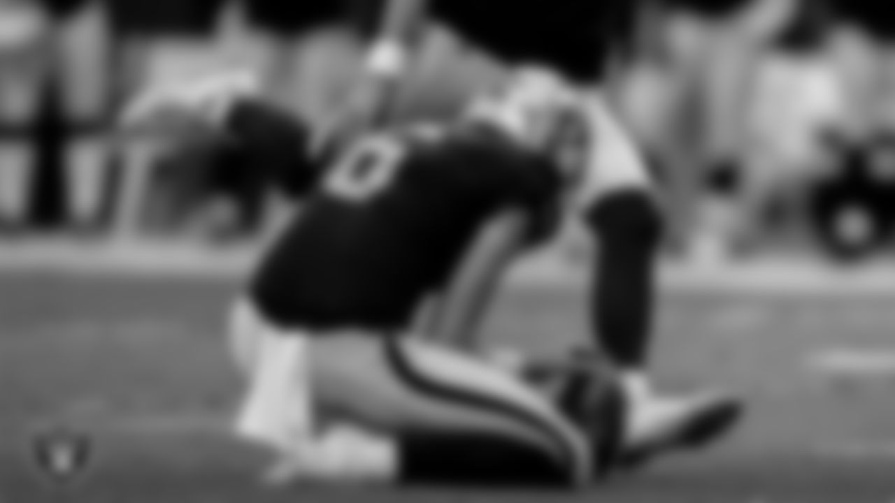 Las Vegas Raiders punter AJ Cole (6) holds on a kick attempt during the regular season home game against the Denver Broncos at Allegiant Stadium.