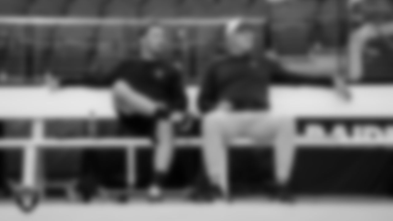 Las Vegas Raiders returners coach and coaching assistant Danny Amendola and offensive quality control coach Mitch Singler on the bench before the regular season home game against the Pittsburgh Steelers at Allegiant Stadium.