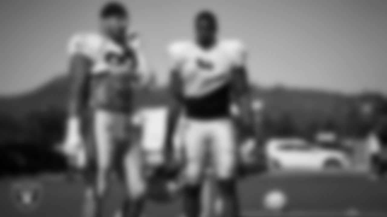 Las Vegas Raiders defensive end Maxx Crosby (98) and defensive end Tyree Wilson (9) on the field for a joint practice with the Los Angeles Rams at 2023 Training Camp at California Lutheran University.