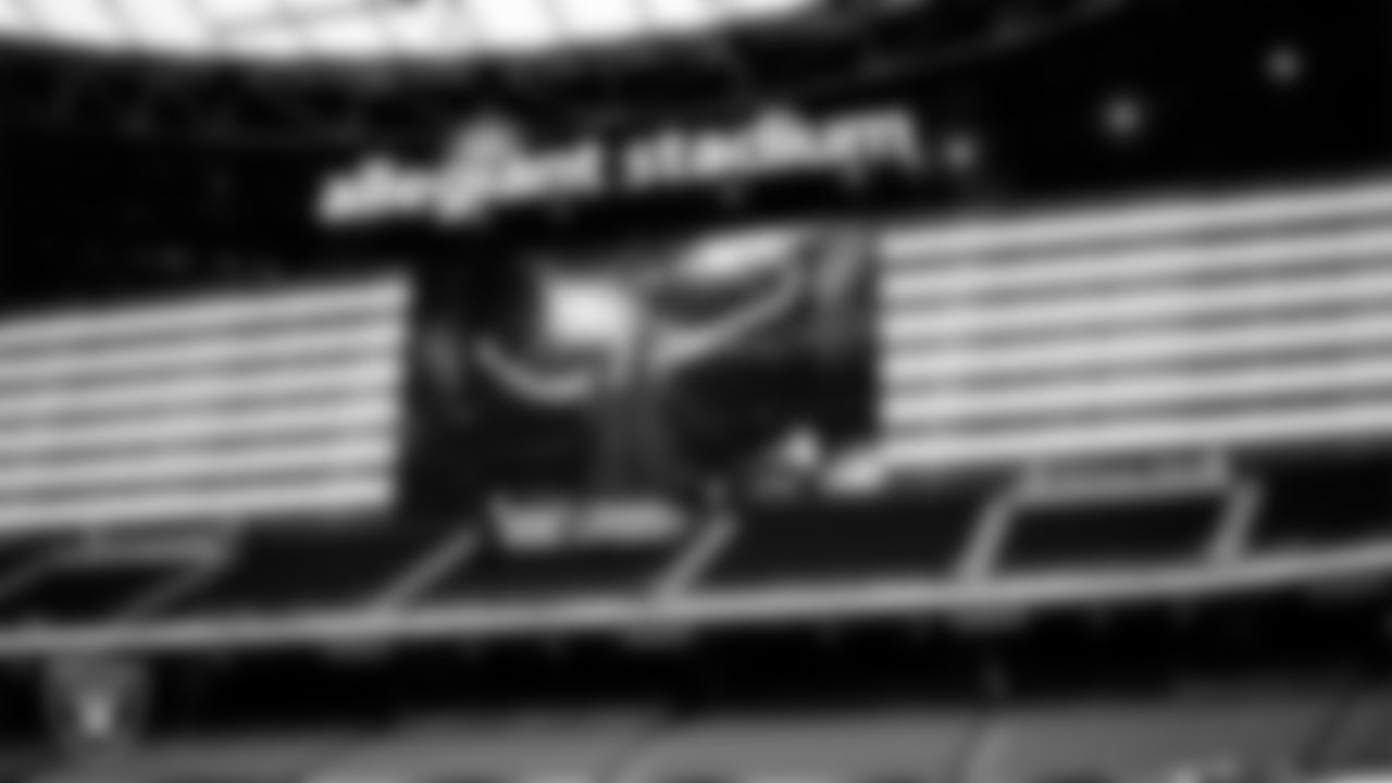 A pre-recorded video of singer Mariah Carey performing the national anthem plays before the Las Vegas Raiders regular season home game against the Denver Broncos.