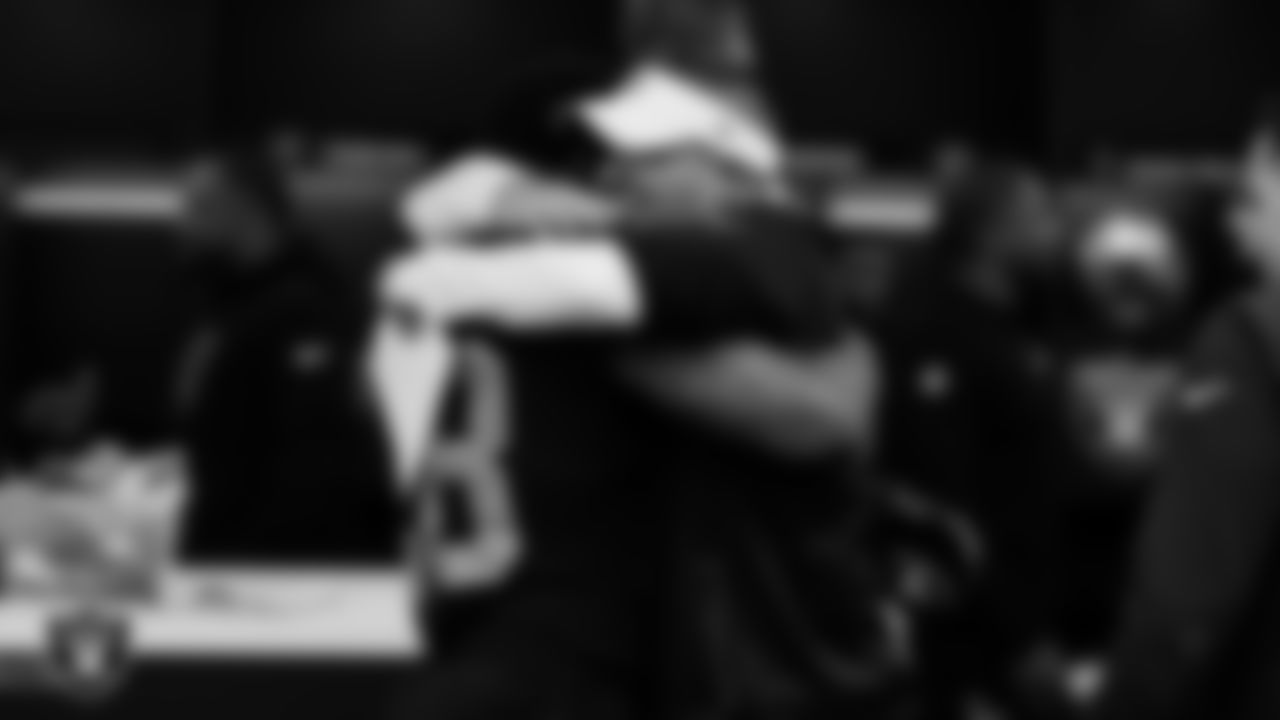 Las Vegas Raiders running back Josh Jacobs (28) and Head Coach Josh McDaniels in the locker room after the regular season home game against the Los Angeles Chargers at Allegiant Stadium.
