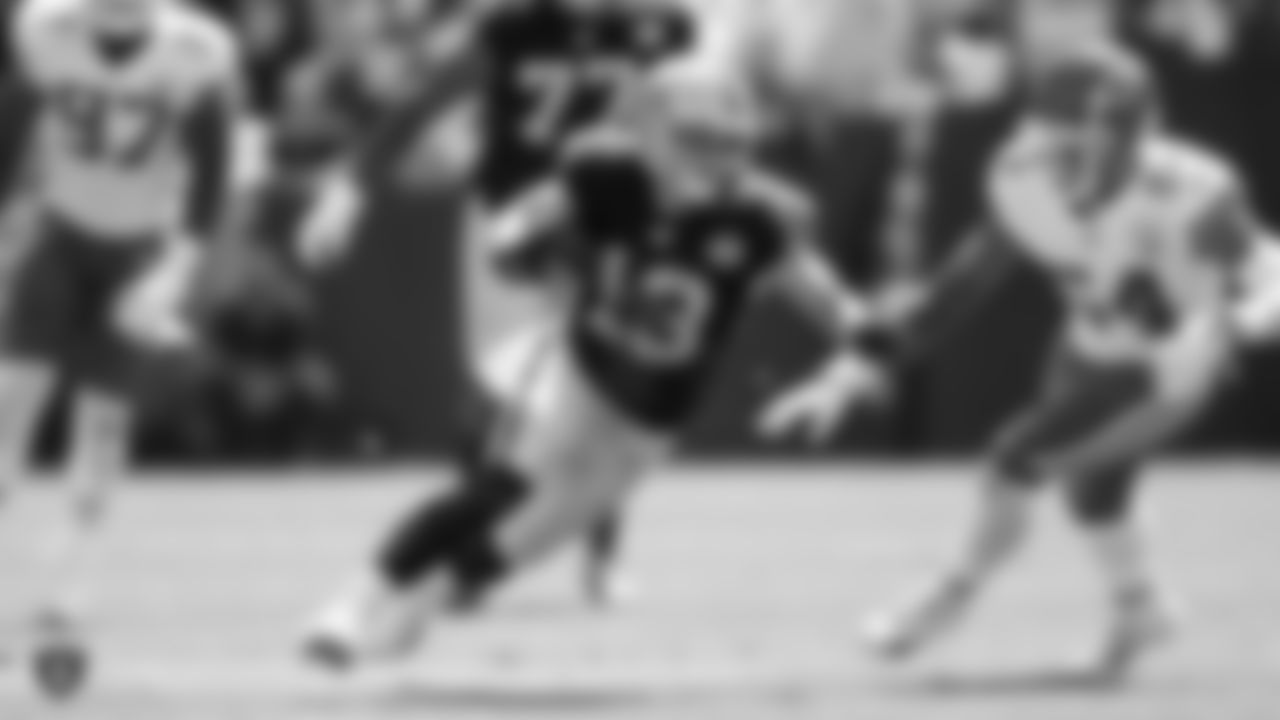 Raiders wide receiver Hunter Renfrow (13) runs after making a catch during the Raiders regular season game against the Kansas City Chiefs.