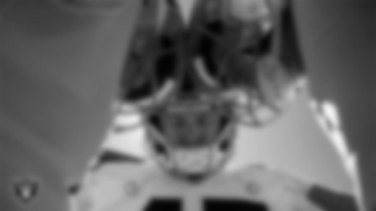 Las Vegas Raiders punter AJ Cole (6), long snapper Trent Sieg (47) and kicker Daniel Carlson (2) huddle in the tunnel before the regular season away game against the Denver Broncos.