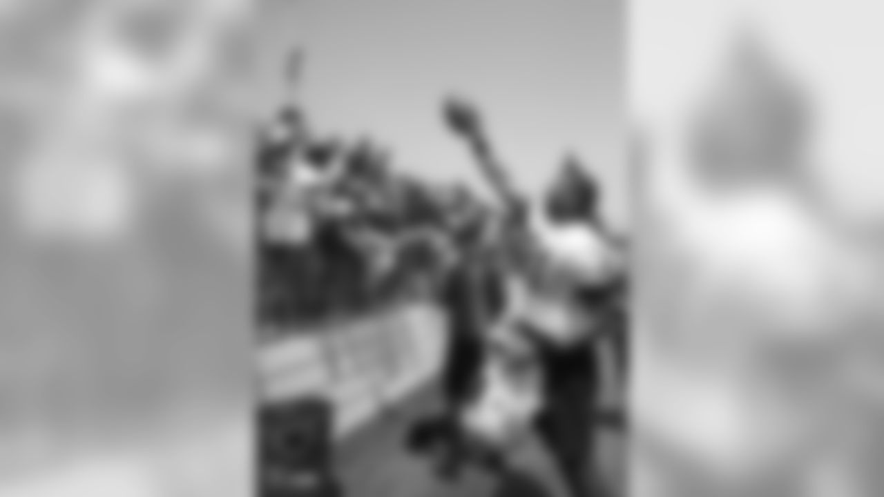 Oakland Raiders tight end Pharaoh Brown (81) signs autographs for fans after practice at 2018 Training Camp at Memorial Stadium, Saturday, July 28, 2018, in Napa, California.