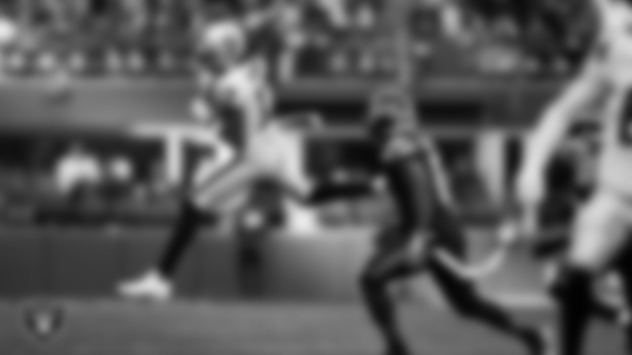 Las Vegas Raiders wide receiver Davante Adams (17) makes a catch during the regular season away game against the Seattle Seahawks at Lumen Field.