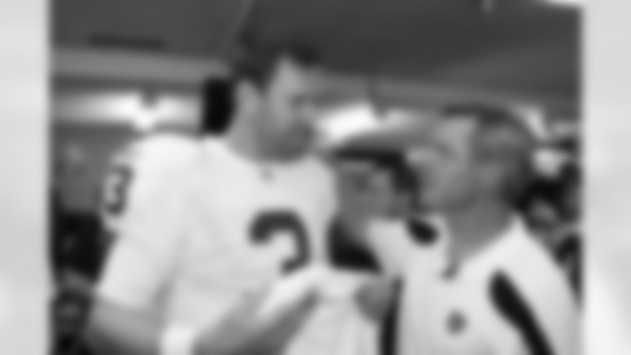 QB Carson Palmer and offensive coordinator Al Saunders