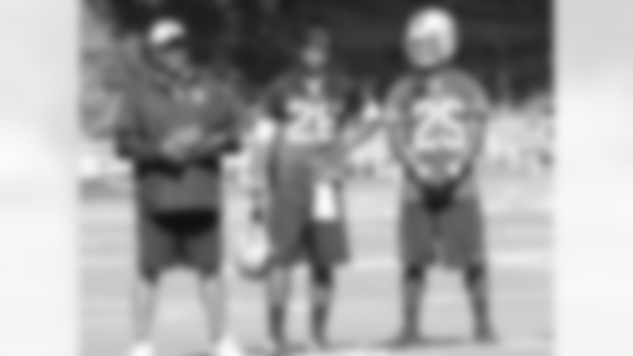 Defensive back coach Johnnie Lynn with S Usama Young and rookie CB DJ Hayden