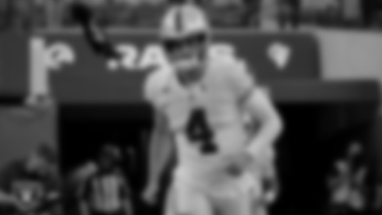 Las Vegas Raiders quarterback Derek Carr (4) warms up before the preseason game against the Los Angeles Rams at SoFi Stadium.