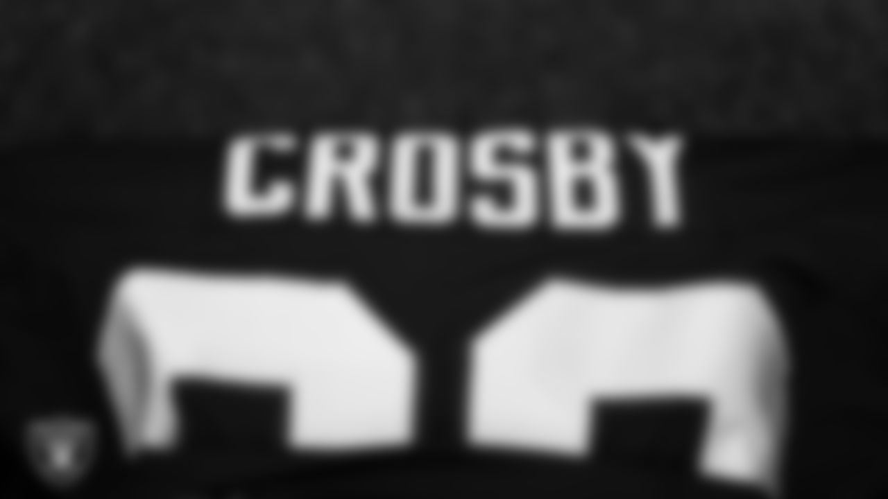 Las Vegas Raiders defensive end Maxx Crosby's (98) jersey and pads in the locker room prior to the Raiders' arrival for their preseason away game against the Dallas Cowboys at AT&T Stadium.