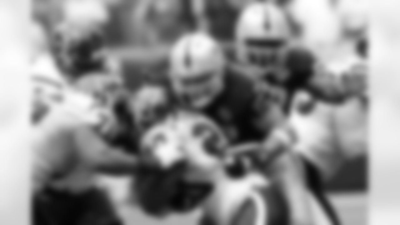 LB Ricky Brown and the defense makes the tackle.