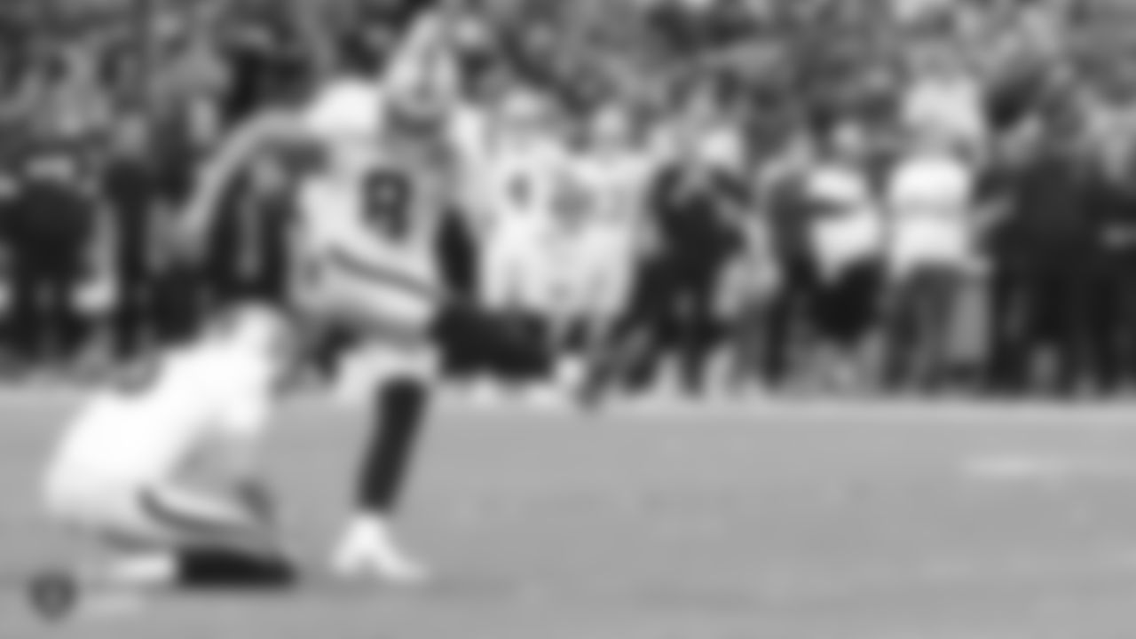 Raiders kicker Daniel Carlson (8) kicks an extra point during the Raiders regular season game against the Indianapolis Colts.