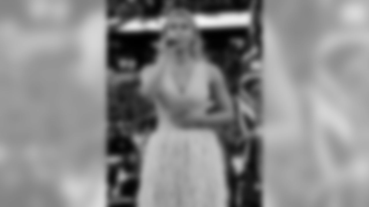 Singer Camilla Kerslake sings the British National Anthem before the Raiders regular season game against the Chicago Bears.