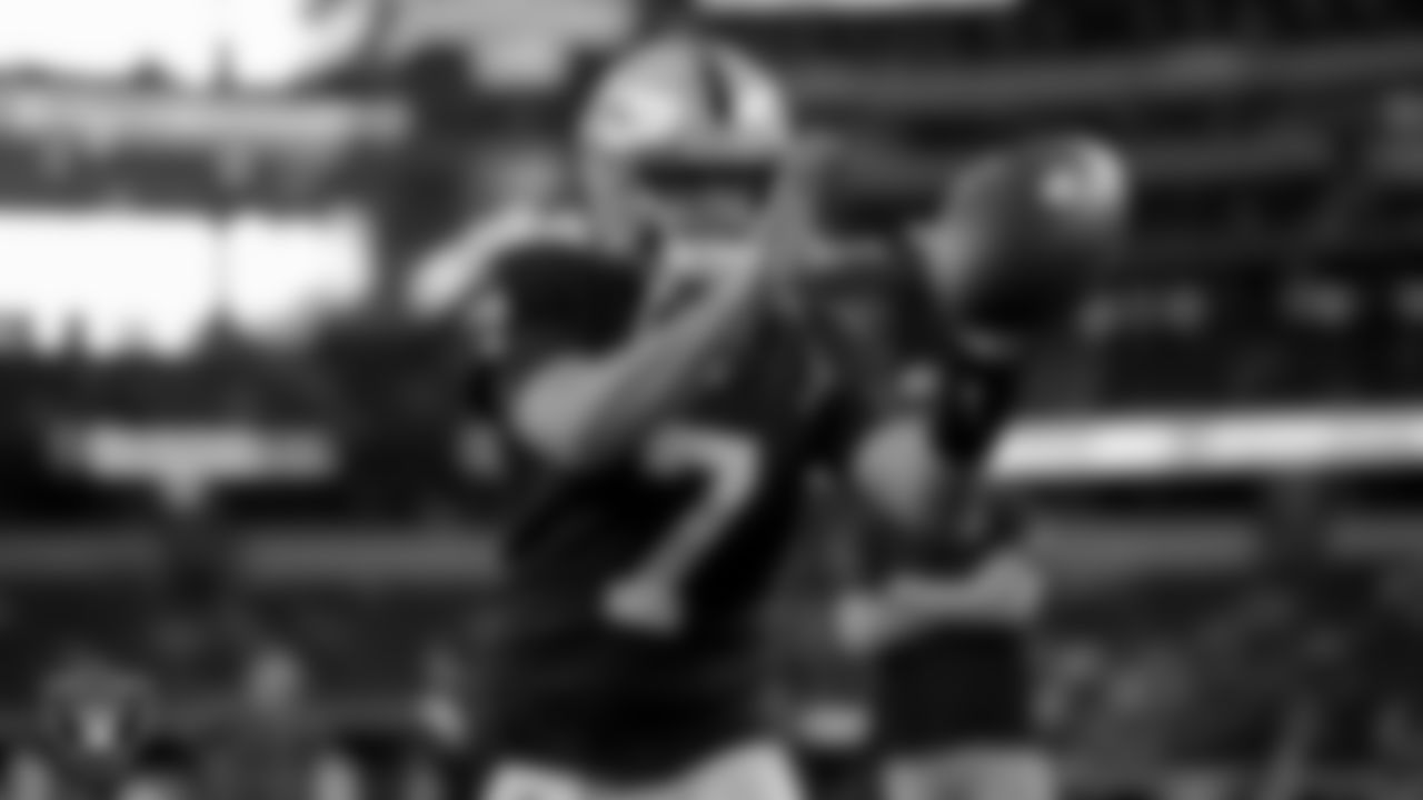 Las Vegas Raiders quarterback Brian Hoyer (7) warming up before the preseason away game against the Dallas Cowboys at AT&T Stadium.