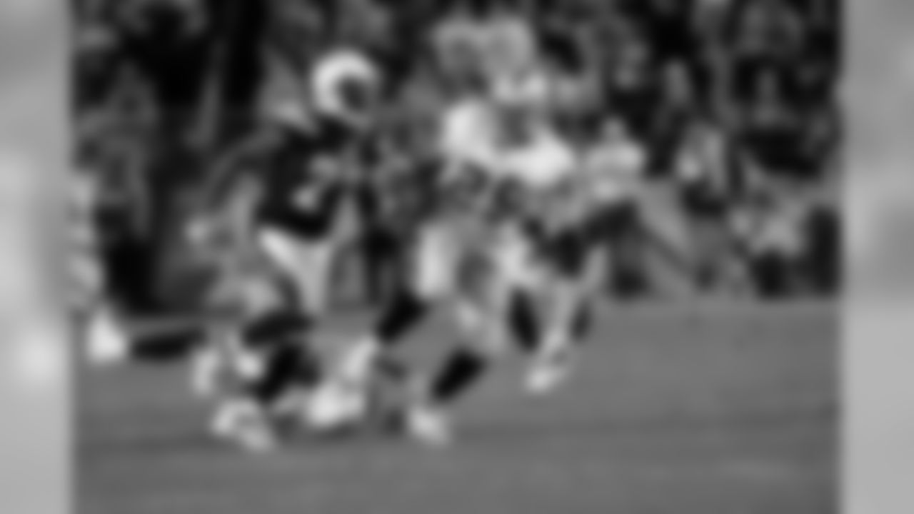 RB Michael Bush eludes a tackle for extra yards.
