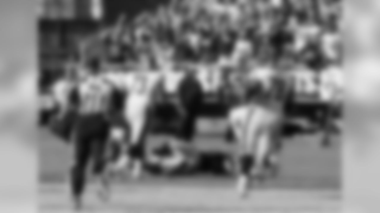 LB Philip Wheeler recovers the fumble for the Raiders.