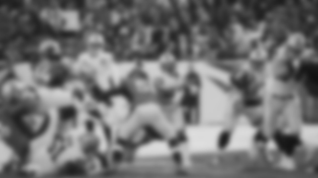 The Raiders during the regular season game against the Denver Broncos at Empower Field at Mile High.