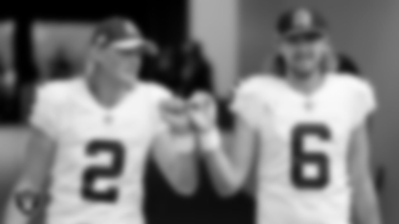 Las Vegas Raiders kicker Daniel Carlson (2) and punter AJ Cole (6) walk down the tunnel before the regular season away game against the Jacksonville Jaguars at TIAA Bank Field.