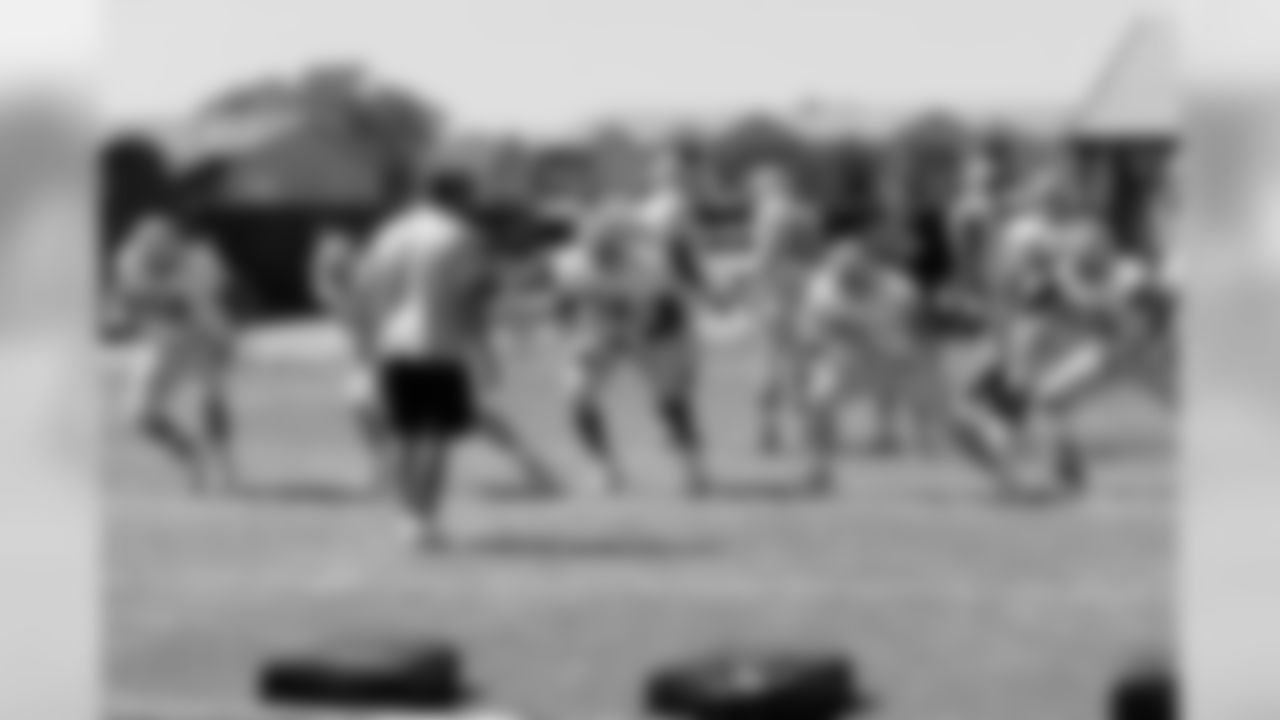 Offensive linemen work on their techniques. Photo by Tony Gonzales.