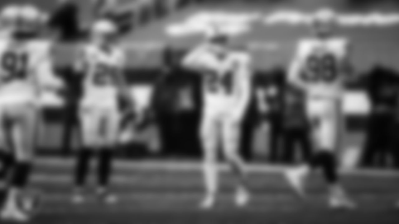 Las Vegas Raiders safety Erik Harris (25), safety Johnathan Abram (24) and defensive end Maxx Crosby (98) during the regular season away game against the Cleveland Browns.