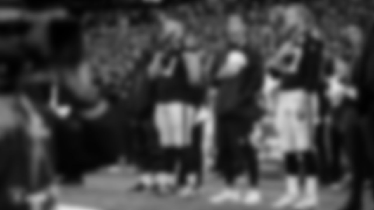 Raiders tight end Foster Moreau (87), quarterback Nathan Peterman (3) and long snapper Trent Sieg (47) during the national anthem before the regular season game against the Chicago Bears.